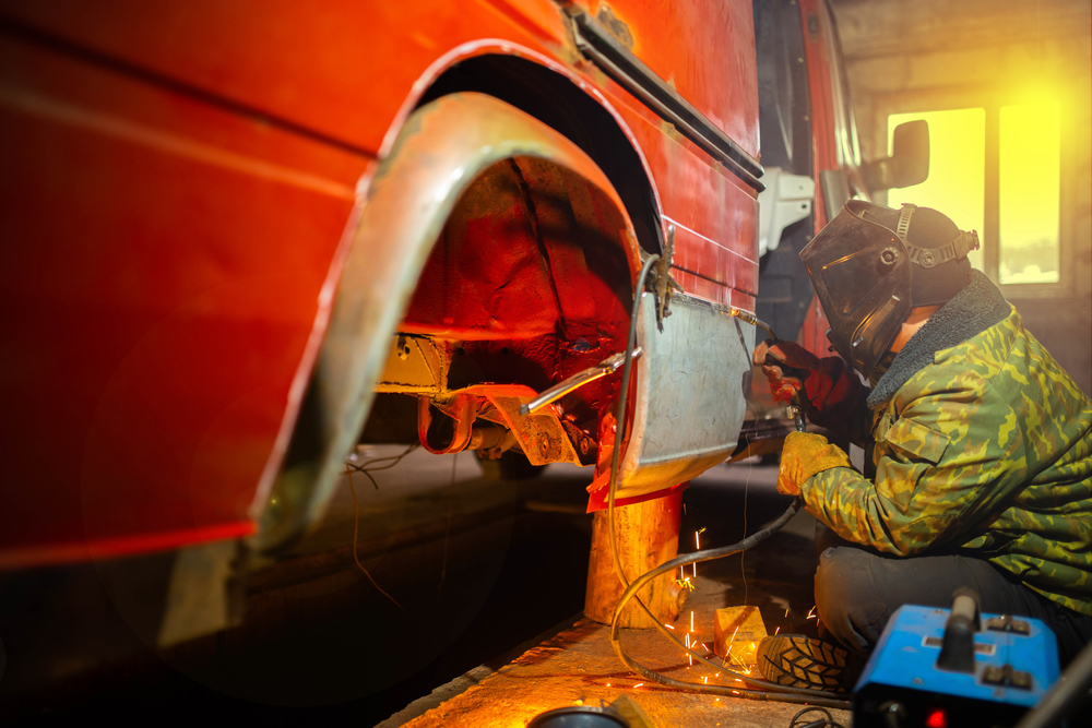 Welding,Work,On,Car,Body,Repair,In,The,Garage.,Truck